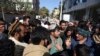 Afghan visa applicants stand outside of the Pakistan Embassy in Kabul. (file photo)