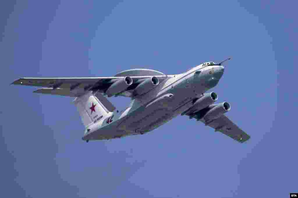 A Russian Beriev A-50 airborne early warning and control aircraft flies over central Moscow in May 2019.  Kyiv claimed on January 15 that its military shot down an A-50 over the Sea of Azov. Kremlin spokesman Dmitry Peskov said he had “no information” about Ukraine striking the aircraft. He passed Russian reporters on to the Defense Ministry, which has remained silent on the claim.  