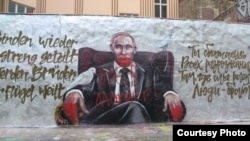 Граффити Владимира Путина в Берлине