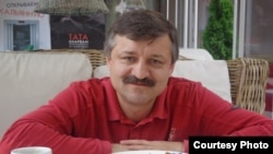 Roman Romanenko has had a swastika daubed on his door.