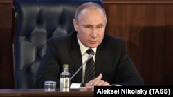 Russian President Vladimir Putin speaks at an extended Defense Ministry meeting in Moscow on December 22.