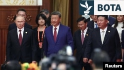 Presidenti rus, Vladimir Putin, ai kinez, Xi Jinping dhe udhëheqësi i Koresë së Veriut, Kim Jong Un. Pekin, 3 shtator 2025.