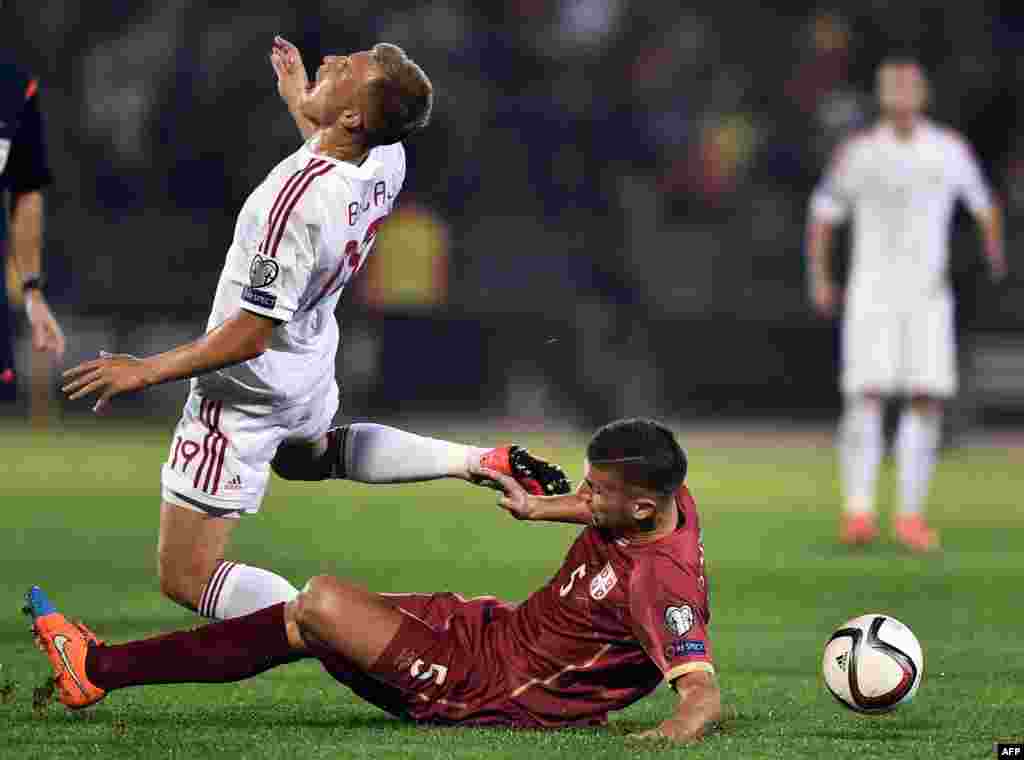 The teams played through one stoppage and nearly 40 minutes of scoreless football until flares thrown toward the Albanian players interrupted play.