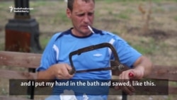 Russian Man Cuts Off Finger, Alleging Police Raped His Wife Russian Man Cuts Off Finger, Alleging Police Raped His Wife