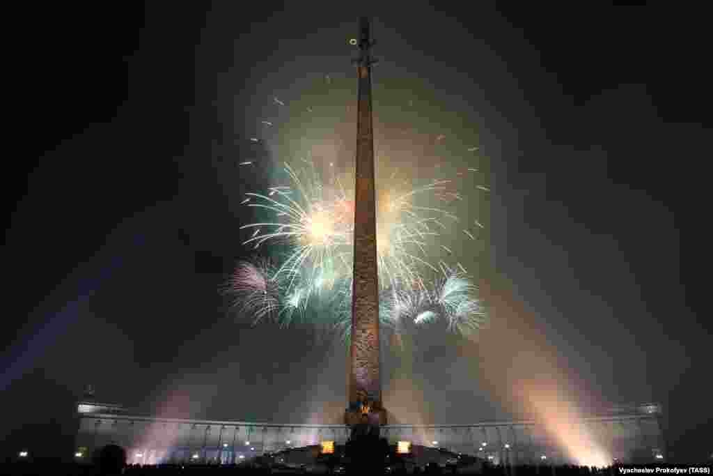 Fireworks go off over Poklonnaya Hill to mark Defender of the Fatherland Day in Moscow on February 23. Located at the Poklonnaya Hill is the museum of the Great Patriotic War, which features 14,143 square meters of exhibition space on the territory of a 2,424-hectare park. Located in the center of the square is an obelisk and a statue of Nike, the Greek goddess of victory.