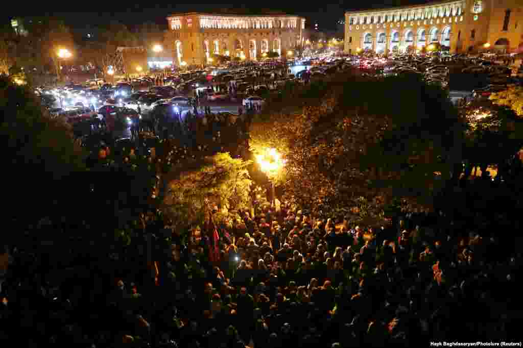 Crowds gather outside a government building in the early hours of November 10 after Armenian Prime Minister Nikol Pashinian announced via social media that he had signed a Russian-brokered deal to end the conflict in Nagorno-Karabakh. 