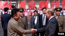 Ким Чен Ир и Владимир Путин