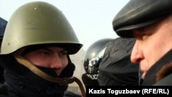 Police have raided the home of opposition leader Vladimir Kozlov (pictured right)