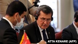 Turkmen Foreign Minister Rashid Meredov (center) attends the multilateral conference on Afghanistan in Tehran on October 27.