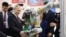 Владимир Путин в ходе визита в Китай посещает выставку технических разработок Харбинского технологического института, 2024 год