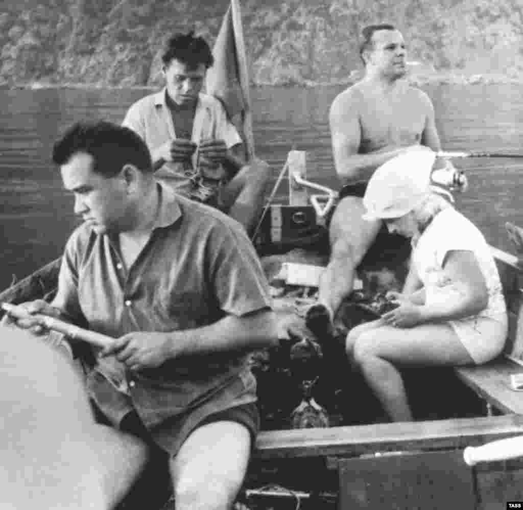 Soviet luminaries like cosmonaut Yury Gagarin, the first man in space, were also frequent visitors to Crimea. Here, Gagarin (smoking) and composer Aleksandra Pakhmutova (far right) during a fishing trip in the resort town of Hurzuf in June 1965. 