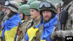 Бойцы спецподразделения Министерства внутренних дел Украины перед отправкой на фронт. Харьков, июнь 2015