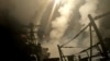 A ship fires missiles at an undisclosed location after U.S. President Donald Trump launched military strikes against Yemen's Iran-aligned Houthis on March 15, 2025.