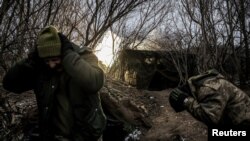 Outgunned and outmanned, exhausted Ukrainian troops are struggling to hold back Russian advance across the 1,100-kilometer front line.