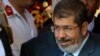 Morsi 'Will Respect' Parliament Ruling