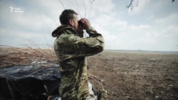На Новолуганском направлении со стороны боевиков висят флаги СССР и России (видео) На Новолуганском направлении со стороны боевиков висят флаги СССР и России (видео)