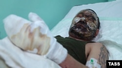 Is this Russian soldier Dorzhi Batomunkuyev in a Donetsk burn unit, or not?