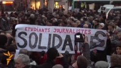 Thousands Hold Vigil In Paris For Shooting Victims Thousands Hold Vigil In Paris For Shooting Victims