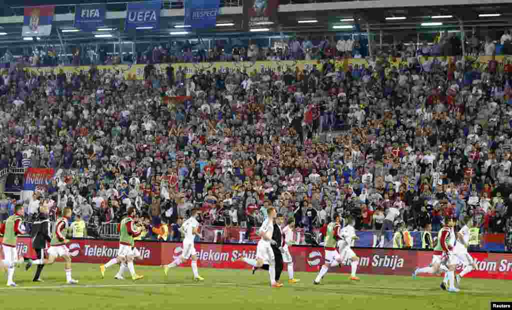 After about a minute of dangerous chaos and the crowd seemingly at fever pitch but the worst of the violence seemingly over, the Albanian team broke for the tunnel.