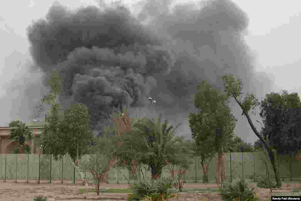 Plumes of smoke rise from the U.S. Embassy compound in March 2008 after Iranian-backed militias shelled Baghdad's Green Zone. Quds Force commander Soleimani played such a pivotal role in Iraq’s security through various militia groups that U.S. General David Petraeus, the overall head of U.S. forces in Iraq at the time, sent messages to him through Iraqi officials.