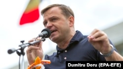 Andrei Nastase speaks at a protest in front of the government building in Chisinau after the invalidation of the mayoral election on July 2.