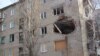 Поврежденный дом в городе Красногоровке Донецкой области
