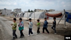 Many children have been badly affected by the crisis in Iraq and Syria. (file photo)