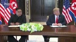 Trump, Kim Sign Document After Talks Trump, Kim Sign Document After Talks