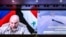 Генерал-полковник Сергей Суровикин участвует в брифинге Министерства обороны России о ситуации в Сирии, 6 сентября 2017 года