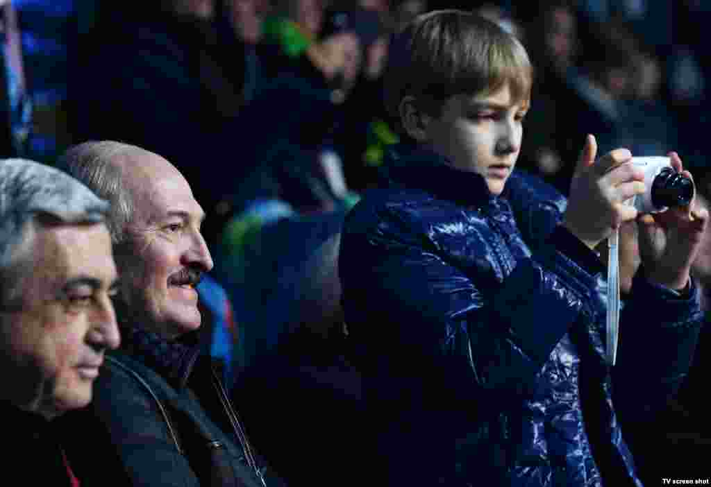 Lukashenka and Kolya attend the Winter Olympics in Sochi, Russia, in February 2014.