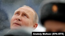 Президент РФ В. Путин в Петербурге 18 января 2018 г.