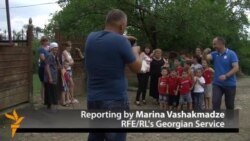 In Georgian Reunion, Two Families' Lives Come Full Circle In Georgian Reunion, Two Families' Lives Come Full Circle
