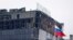 Здание "Крокус Сити Холла" после нападения террористов, 23 марта 2024 года
