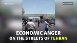 Protests And Tear Gas In Tehran After Currency Plunges Protests And Tear Gas In Tehran After Currency Plunges