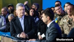 Петр Порошенко и Владимир Зеленский во время дебатов на стадионе «Олимпийский». Киев, 19 апреля 2019 год