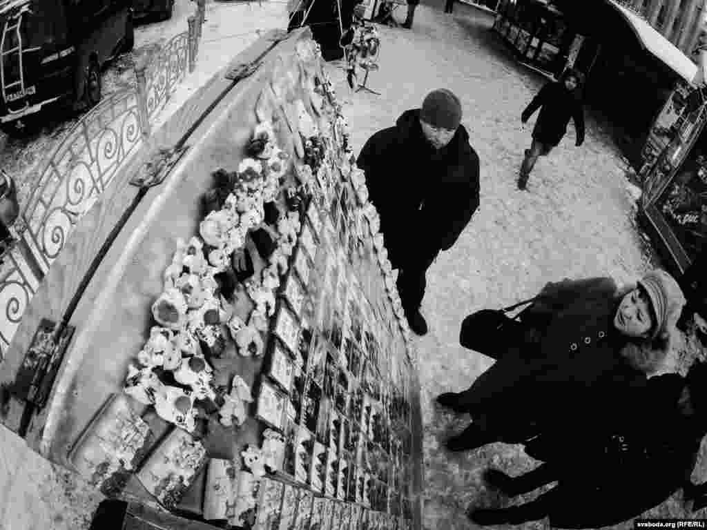 A souvenir stand offers magnets and t-shirts stating "I was at the Maidan" -- the alternate name of Independence Square and shorthand for the antigovernment protests.