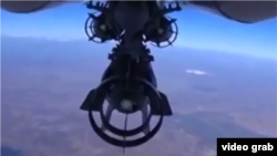 Снимок с борта российского военного самолета на территорию Сирии