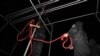 Iranian security officers prepare a rope for hanging. members preparing hanging rope. The Islamic republic has executed more people than any other country in the world other than China so far this year, according to Amnesty International. (file photo)