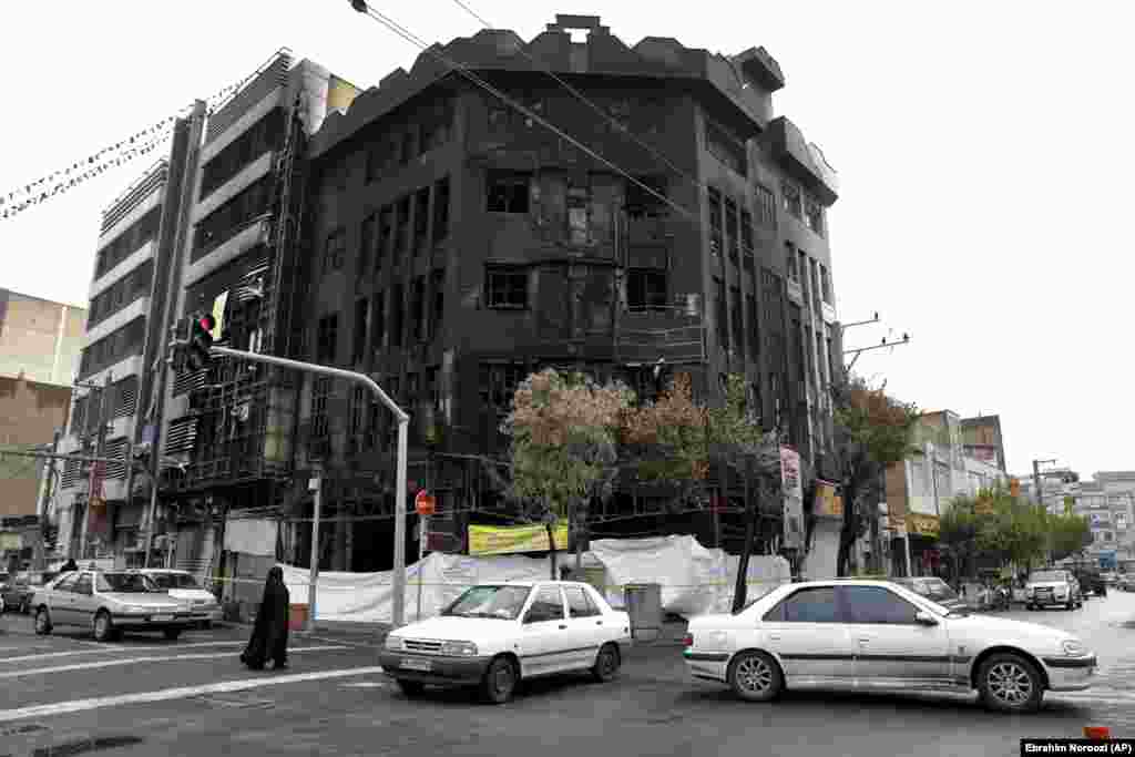 A building in Tehran that was gutted by fire during protests which erupted across Iran after the government announced it would cut subsidies to gasoline on November 15, leading to dramatic increases in prices. 