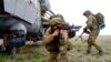 Russian troops take part in drills in Crimea, which Moscow forcibly seized from Ukraine in 2014.